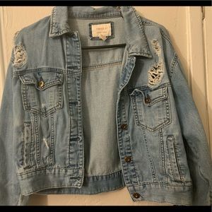 Distressed denim jacket